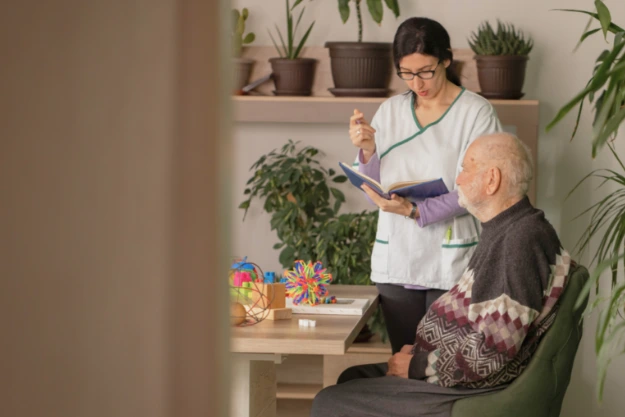 caregiver assisting senior at home